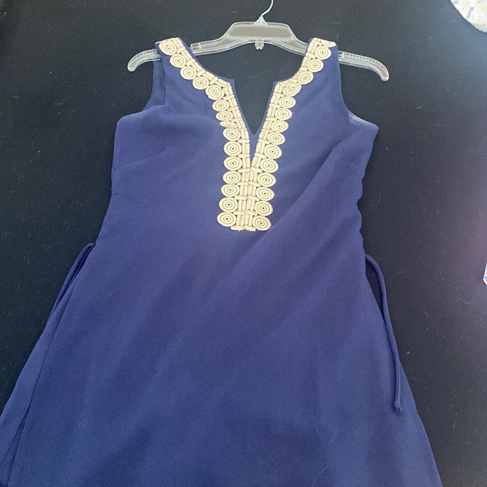 Gorgeous lilly romper with gold trim worn once